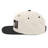 MANHATTAN NATURAL AND BLACK SNAPBACK